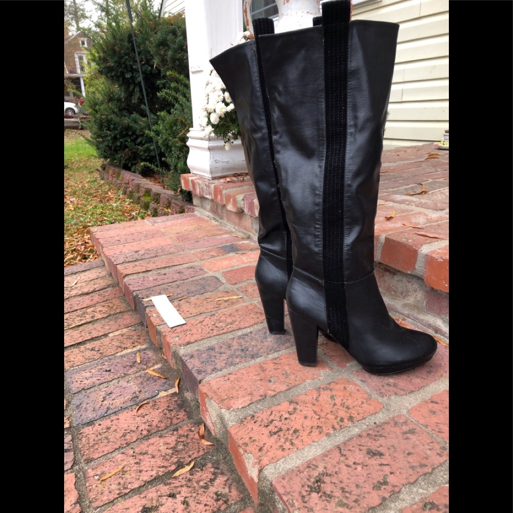 Black leather boot.